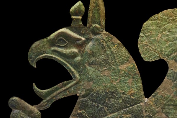 Section of a monumental bronze sheet, griffin, complex bronze sculpture of a mythological being with patina and complex patterns, Olympia Archaeological Museum, Ancient Olympia, Olympia, Peloponnese, Greece