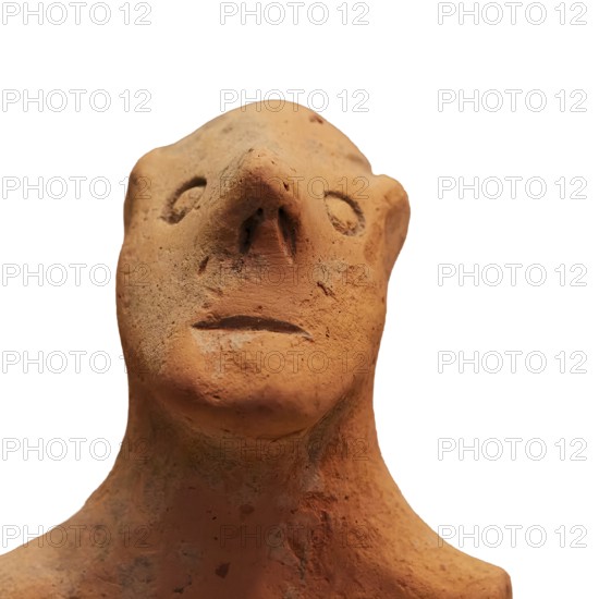 Anthropomorphic votive statuette, clay figure with abstract animal form, simple design and earthy colors, Olympia Archaeological Museum, Ancient Olympia, Olympia, Peloponnese, Greece