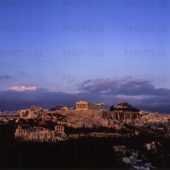 Acropolis, general view from south, sunset with dark clouds, Athens, Greece