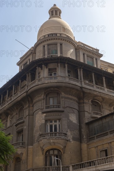 Classic Cairo architectural detail showing beautiful covered balconies and domed roof, historical buildings of downtown Cairo reflect its cosmopolitan past. Egypt