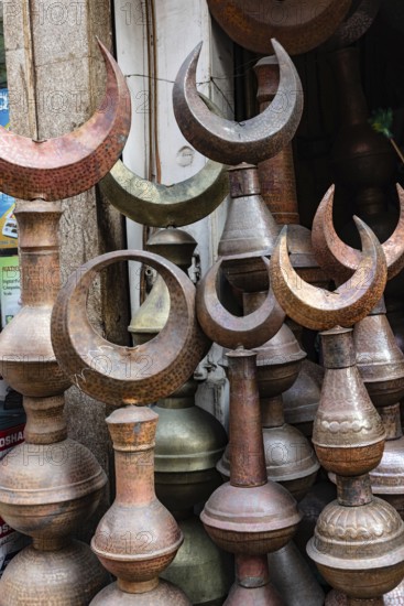 Cairo, Egypt. December 5th 2022 Copper and Brass minaret tops for sale at a shop in Islamic Cairo nr the famous tourist Khan el Khalili Bazaar, Cairo, Egypt