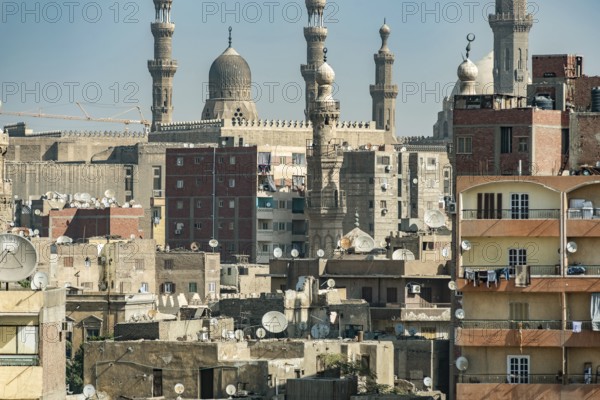 Cairo, Egypt. November 29th 2022 Aerial rooftop view of the densely populated Egyptian capital city Cairo with the Mosque minarets of Islamic Cairo in the background