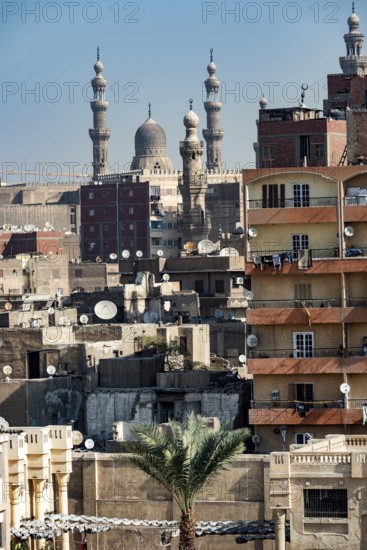 Cairo, Egypt. November 29th 2022 Aerial rooftop view of the densely populated Egyptian capital city with the mosques and minarets of Islamic Cairo in the background