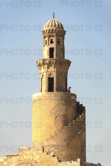 Cairo, Egypt. November 29th 2022 Tourists climb the Spiral Tulunid Dynasty Minaret of Ibn Tulin Mosque in Cairo, one of the oldest mosques in Egypt
