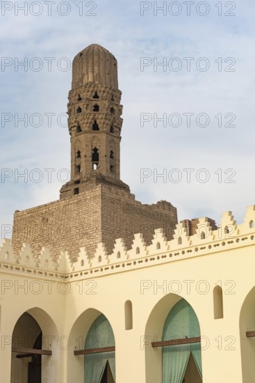 Cairo, Egypt. November 27th 2022 Minaret of historic Mosque of al-Hakim, known as Al-Anwar, named after Al-Hakim bi-Amr Allah. Inside the Fatimid gate, Bab al-Futuh in Islamic Cairo, Egypt