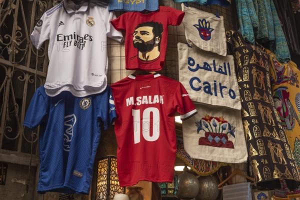 Cairo, Egypt, November 26th 2022 Egyptian, Mo Salah football shirts being sold as tourist souvenirs in the famous Khan El Khalili Bazaar in Islamic Cairo, Egypt