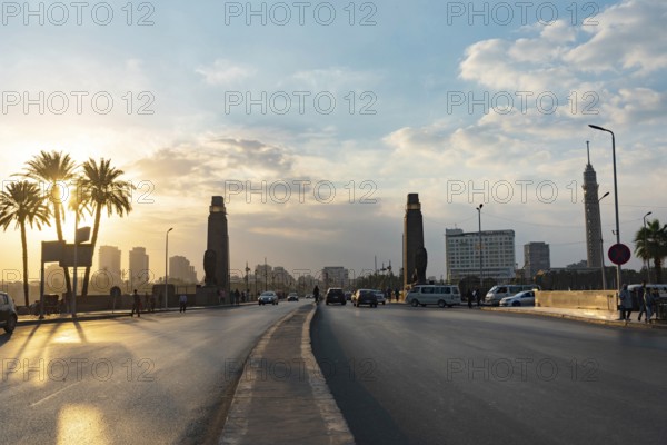 Cairo, Egypt. November 26th 2022 Qasr El Nil Bridge over the River Nile near Tahrih Square in Downtown Cairo cityscape at sunset panorama urban landscape