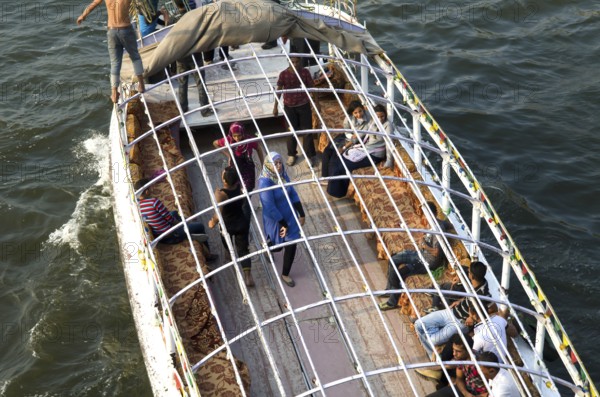 Cairo, Egypt. October 20th 2011 Young Egyptians dance and have fun on a Nile boat, Cairo, Egypt