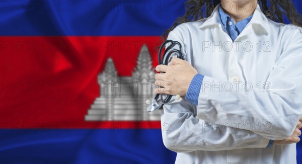 Healthcare professional with Cambodia flag background. Professional doctor holding stethoscope on Cambodia flag background