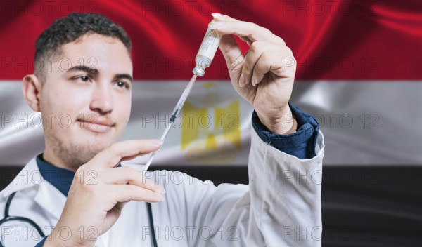 Doctor holding syringe on Egypt flag background. Medical professional holding syringe with Egyptian flag in the background