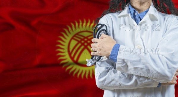 Healthcare professional with Kyrgyzstan flag background. Professional doctor holding stethoscope on Kyrgyzstan flag background