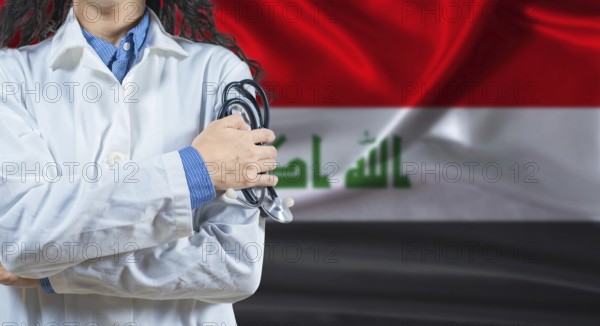 Healthcare professional with Iraq flag background. Professional doctor holding stethoscope on Iraq flag background