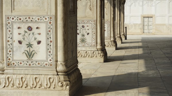 Detailed marble decorations on architecture with columns and crown, Red Fort, Delhi, India