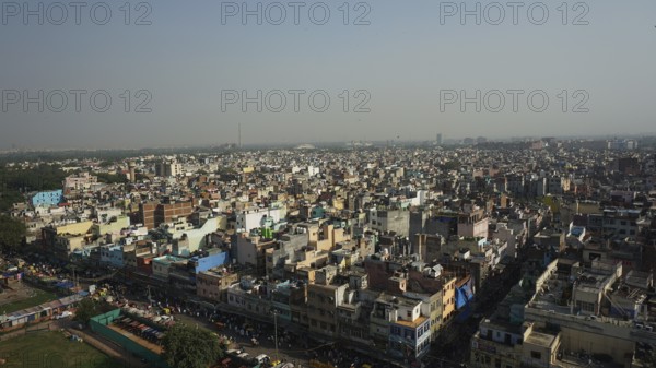 Far-reaching view of an Indian cityscape, Delhi under clear sky, Delhi, India