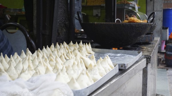 Preparing samosas in an Indian food stand, Manali, Himachal Pradesh, India