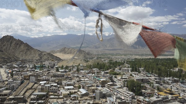 Colorful prayer flags over Leh, view from Leh Palace with mountain landscape in the background, Ladakh, North India, Himalayas, India