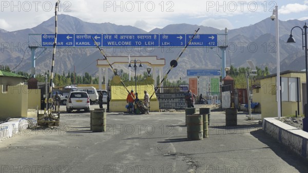 Entrance to Leh with a welcome sign and views of the surrounding mountains, Leh, Ladakh, North India, Himalayas, India