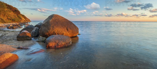 Coastal landscape with large boulders on the Baltic Sea beach in the evening light, Mönchgut Nature Reserve, Groß Zicker, Mönchgut Peninsula, Rügen Island, Mecklenburg-Western Pomerania, Germany