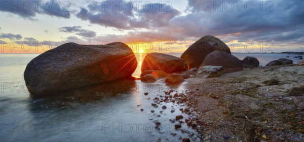 Large boulders on the Baltic Sea beach at sunset, Mönchgut Nature Reserve, Groß Zicker, Mönchgut Peninsula, Rügen Island, Mecklenburg-Western Pomerania, Germany