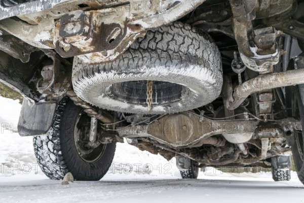 View from underneath a Toyota Tacoma car in winter. Region of La Mauricie, Province of Quebec, Canada