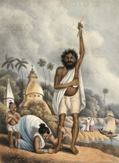 Fakir in India is worshipped by a woman kneeling in front of him, authentic, digitally restored reproduction from a 19th-century model, exact date of depiction unknown, historical, a man standing with a raised hand, a woman kneeling next to him, a temple in the background and boats on the river