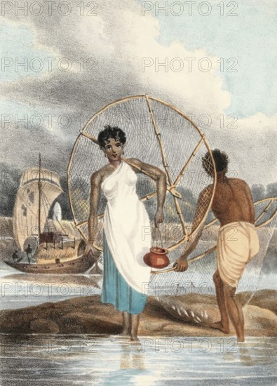 Fisherman and woman with net and small fish on shore, India, authentic, digitally restored reproduction from a 19th century model, exact date of depiction unknown, historical, two people at the water, a man with a net and a woman with a pot, in the background a boat under a cloudy sky