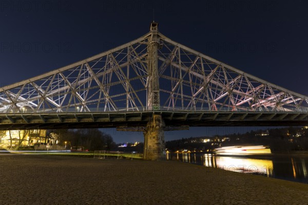 Elbbrücke Blaues Wunder at night, an illuminated Saxon steamship steamer sails on the Elbe, the Elbe Castles can be seen in the background, Blasewitz, Dresden, Saxony, Germany