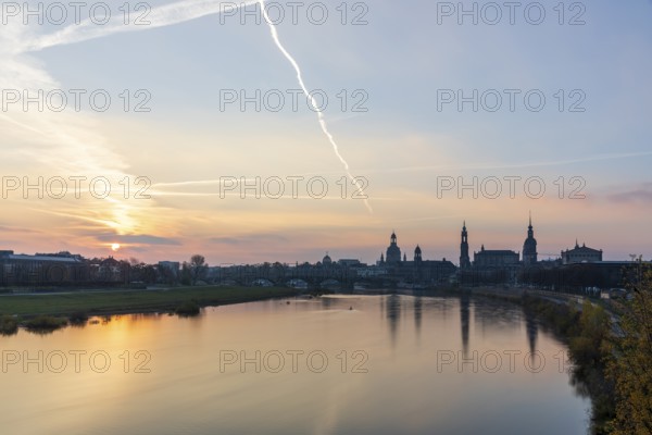 City view with Elbe, Academy of Arts, Church of Our Lady, Ständehaus, Hofkirche, Hausmannsturm and Semper Opera at sunrise, Dresden, Saxony, Germany
