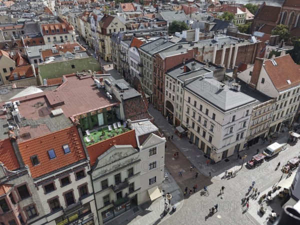 Aerial view of Torun a city with red roofs and a busy street, Torun, Poland
