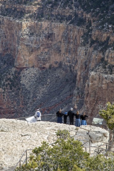 Grand Canyon National Park, Arizona. Visitors at the Trail View Overlook on the South Rim. The overlook provides a view of the Bright Angel Trail, which leads to the Colorado River