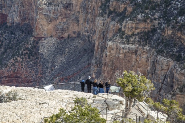 Grand Canyon National Park, Arizona. Visitors at the Trail View Overlook on the South Rim. The overlook provides a view of the Bright Angel Trail, which leads to the Colorado River