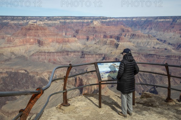 Grand Canyon National Park, Arizona. A visitor views the Grand Canyon from Mohave Point on the South Rim
