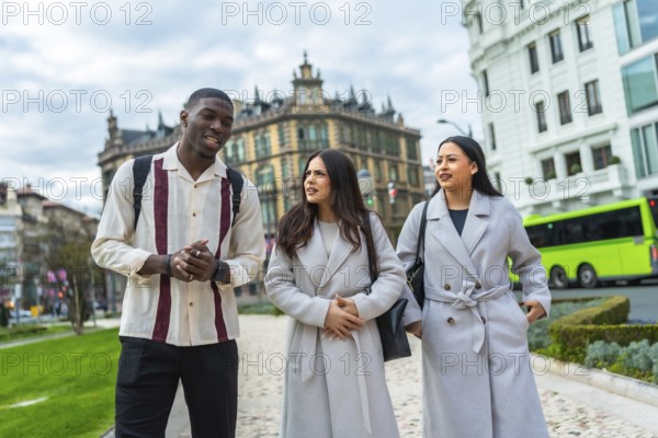 Diverse friends enjoying a casual walk through an urban park, engaging in conversation while exploring the vibrant cityscape with classic architecture and a modern bus