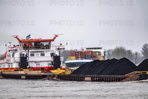Veerhaven-4 push association with coal for the coking plant of Hüttenwerke Krupp-Mannesamnn, HKM, in Duisburg, behind container freighter sensation both ships are of Dutch origin, on the Rhine near Xanten, North Rhine-Westphalia, Germany