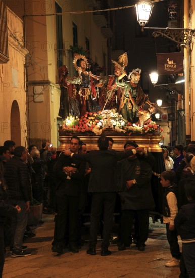Sicily, old town of Trapani, Good Friday mystery procession La Processione dei Misteri, procession with the mysteries, through the alleys of the old town at night, scenes from the Passion of Christ