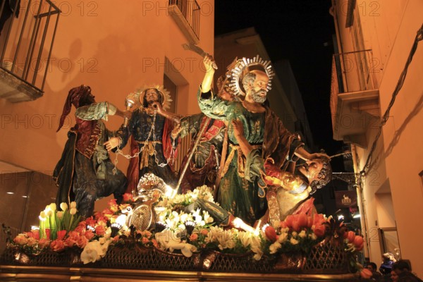 Sicily, old town of Trapani, Good Friday mystery procession La Processione dei Misteri, procession with the mysteries, through the alleys of the old town at night, scenes from the Passion of Christ