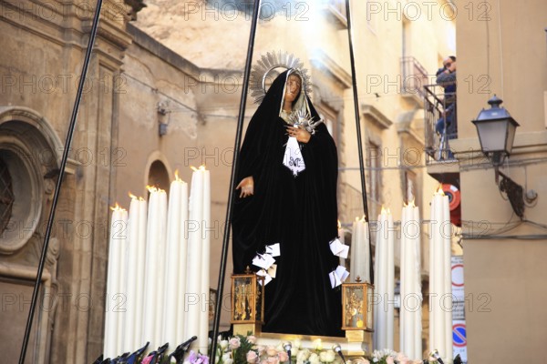 Sicily, old town of Trapani, Good Friday mystery procession La Processione dei Misteri, men, Massari carry the mystery with the Maria Addolorata