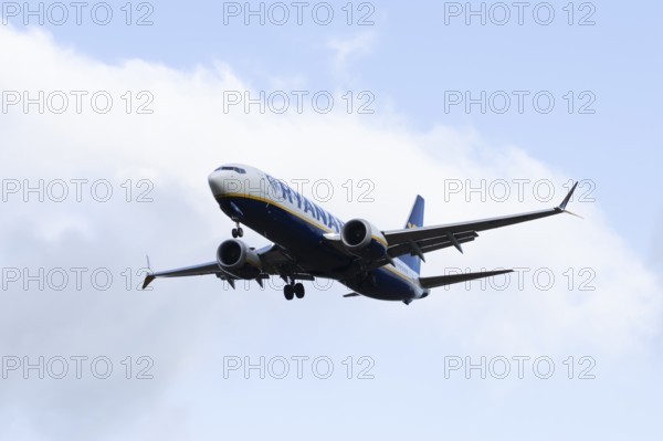 Boeing 737 commercial passenger airliner jet aircraft of Ryanair airways in flight on approach to land at London Stansted airport, Essex, England, United Kingdom