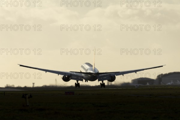 Boeing 777 A7-BFL commercial jet aircraft of Qatar cargo in flight on approach to land at London Stansted airport, Essex, England, United Kingdom