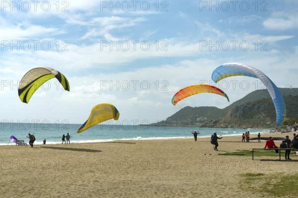 Alanya, Turkey. April 8th 2021 Paragliding from the Taurus Mountains to Kleopatra Beach in the Turkish Mediterranean coast of Alanya, Turkey