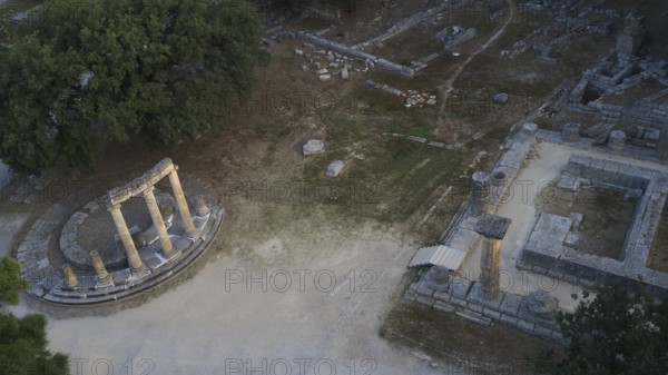 Philippeion, part of the Temple of Hera, aerial view of ancient ruins with columns and trees, drone view, archaeological site, Ancient Olympia, Peloponnese, Greece