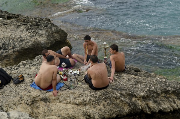 Beirut, Lebanon. May 29th 2012 Beirut Corniche a palm lined promenade beside the Mediterranean Sea, where the Lebanese come to jog, stroll or smoke Shisha, Lebanon