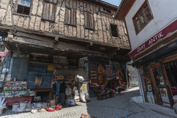 Ankara, Turkey. June 6th 2022 A street market stall selling Turkish rugs and traditional drums in the cobbled streets of Ankara castle, Anatolia, Turkey
