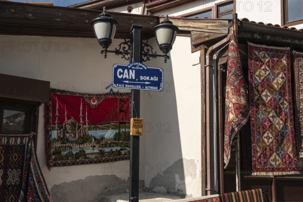 Ankara, Turkey. November 17th 2020 Traditional Turkish carpets for sale outside shops in Ankara castle, Turkey