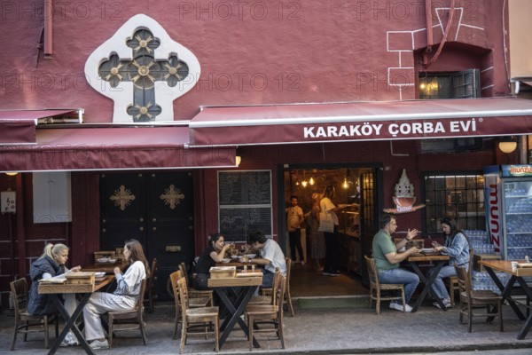 Istanbul, Turkey. September 18th 2025. Customers enjoy eating soup at the Karakoy Corba Evi a popular restaurant specializing in soup in the trendy Karakoy district of Istanbul, Turkey