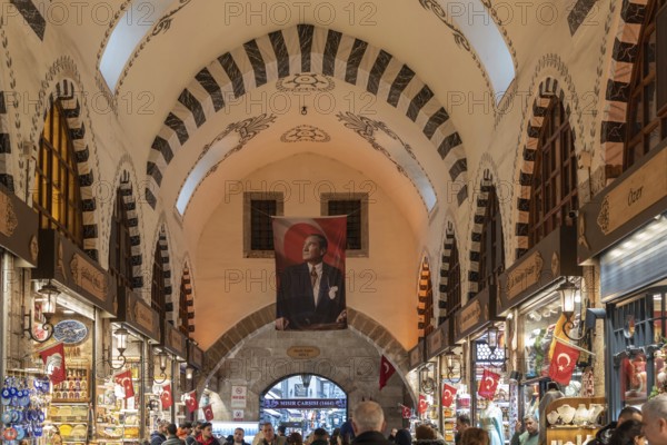 Portrait of Mustafa Kemal Ataturk displayed inside the vaulted architecture of the Istanbul Spice Bazaar