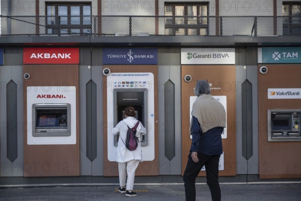 Istanbul, Turkey. September 18th 2025. Customers using Turkish ATM banking machines during a financial crisis in Turkey resulting in high inflation rates and a reduction in value of the Turkish Lira
