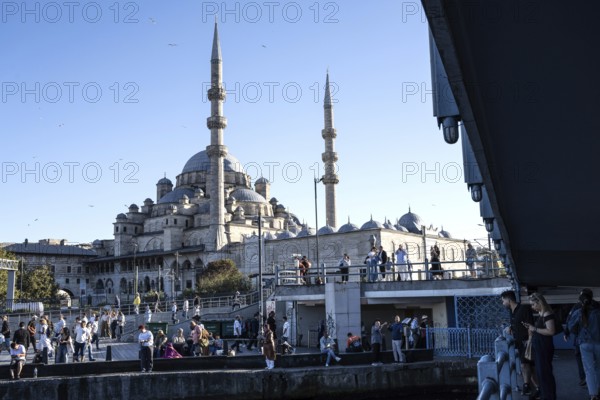 Istanbul, Turkey. January 8th 2025. The busy streets of the Fatih district of Istanbul beside the Galata Bridge and Golden Horn with Yeni Cami a landmark Istanbul Mosque