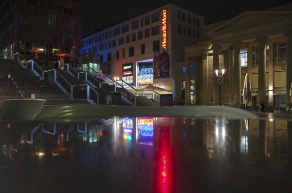 Night view, reflection, neon lighting, logo media market, Tegut, action, Subway, Postbank, Königsbau Passagen, shopping center, shopping center, Schlossplatz, Stuttgart, Baden-Württemberg, Germany