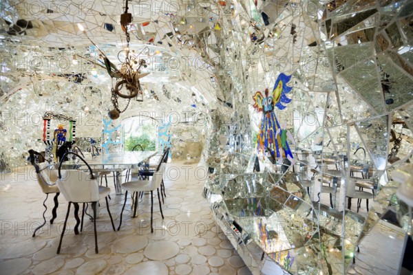 Living room made of glass and mirrors, Giardino dei Tarocchi, Tarot Garden, by Niki de Saint Phalle, near Capalbio, Province of Grosseto, Tuscany, Italy